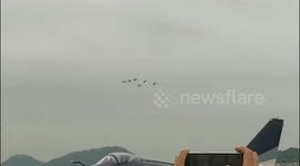 A Flying Squadron Performs At The 14th Airshow China in Zhuhai