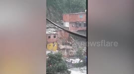 Houses collapse during torrential rain in Venezuela