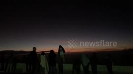 Tourists flock to Thai mountain with temperatures plunging to 3C