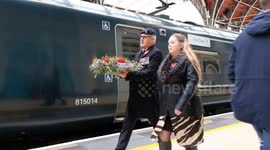 Veterans and station staff place 'Poppies to Paddington' wreaths as they arrive in from dozens of locations ahead of Armistice Day service