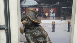 A touching remembrance poppy wreath is left by 'Paddington Bear' in London