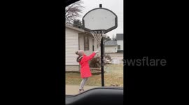 North Dakota blizzard leaves basketball net frozen solid