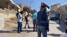 Palestinian demonstrators clash with Israeli forces, following a protest against the expropriation of Palestinian land by Israel, in the West Bank village of Kfar Qaddum near the Jewish settlement of Kedumim