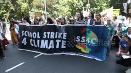 COP27: Protesters gather outside Sydney Town Hall before marching
