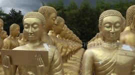 Buddhist shrine has 1,250 golden statues all worshipping giant Buddha