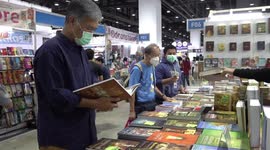 Shoppers buy discounted titles from across the world at book fair in Bangkok