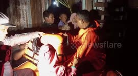 Indonesian firefighters rescue residents trapped in flooded houses