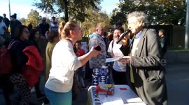 Climate activists confront conspiracy theorist Piers Corbyn at protest outside Shell's London HQ