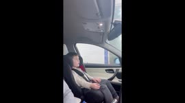 Little boy has hilarious reaction to being inside a car wash!