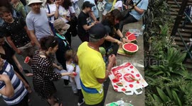 Ukrainians in Sydney celebrate the liberation of Kherson with watermelons, for which the city is known