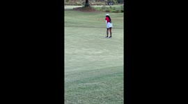 My granddaughter playing at a golf match. She almost made 35-40 foot putt!