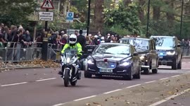 Royal Family convoy drives down Birdcage Walk on the way to Remembrance Sunday ceremony