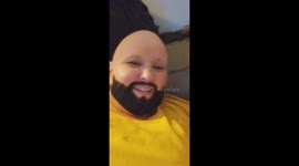 While Babysitting An Aunt Shows Her Niece The Beard Filter On Her Phone Creating A Mini-Me Like Effect That Made Them Both Laugh