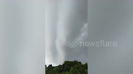 Ominous funnel clouds form over island in the Philippines