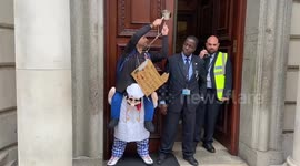Hospitality workers stage noisy protest outside the Treasury in Westminster
