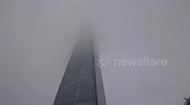 The Shard drowns in thick smog - London