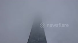 The Shard drowns in thick smog - London