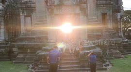 Picturesque moment sunset glows through narrow doorway of ancient Buddhist temple