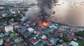 Aerial footage of fire that ripped through residential area killing five in the Philippines