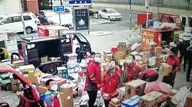 Delivery men confused by sneezing colleague who kept looking up