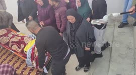 Friends and relatives of Palestinian Fulla al-Masalma, 16, mourn during her funeral