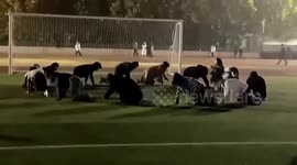 University students spotted crawling in circle on playground in China