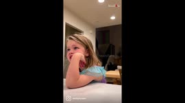 Sweet and calm girl forgives mom for eating all her Halloween candy