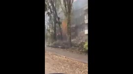footage of damaged residential buildings in Kyiv.