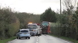 Two children and a woman seriously injured after horror crash involving a school bus