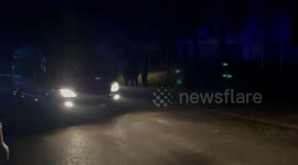 Police vans arrive in Przewodów, Poland, after missile strike