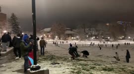 Students play on campus and enjoy first snowstorm in Pennsylvania, US