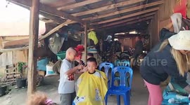 Schoolboy, 7, works as hairdresser at mum's shop 'to earn his own money for Lego toys'