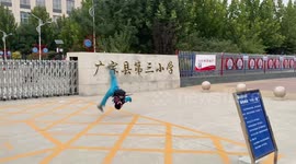 Chinese boy performs impressive martial arts before hopping onto dad's scooter