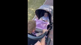 Adorable 5-month-old baby girl can't stop giggling at her big bro's silly antics
