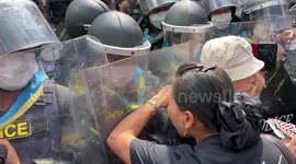 Protesters clash with riot police at rally against APEC summit in Thailand