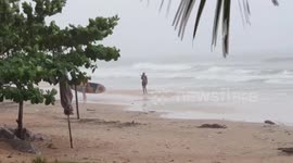 Sprightly American tourist, 78, sparks rescue operation after surfing during storm in Thailand