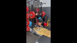Woman trying to squat while holding a HEAVY barbell experiences a COMEDIC fail moment