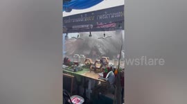 Market stalls battered by tropical storm in Thailand