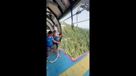 INSANE BUNGEE JUMP! Adventure-lover jumps off 200+ meters bridge without hesitation