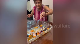 Granny has hilarious reaction to fake fish prank on her birthday