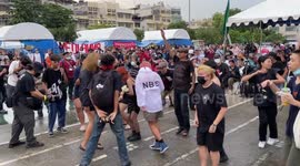 Protesters dance at rally against APEC summit in Bangkok, Thailand