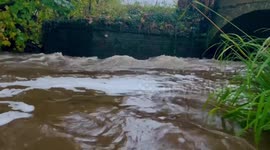 West Yorkshire's River Wharfe floods nearby roads
