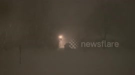 Visibility reduced as snowstorm blankets New York