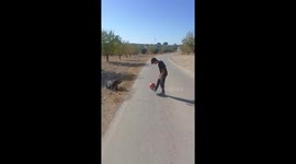 Talented 12-year-old-lad showing his football skills in the mountains of Spain