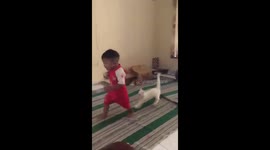The boy was scared of the kitten that chased him!