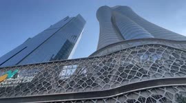 GVs of downtown Doha, where a huge image of the World Cup trophy had been projected onto a building
