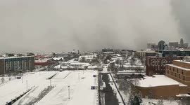 Fantastic view as band of heavy Lake-Effect Snow crosses downtown Buffalo, NY