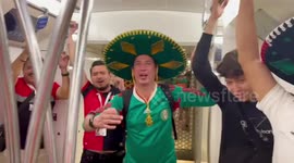 Mexican fans sing on the Doha metro