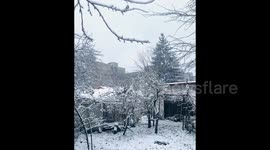 The first snow of the season falls in Lviv as Ukraine war drags on