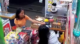 Sneaky customer steals smartphone in front of sleeping cashier